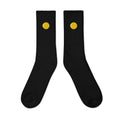Crew socks, outside view, black, "Egg Yolk" embroidery on both socks
