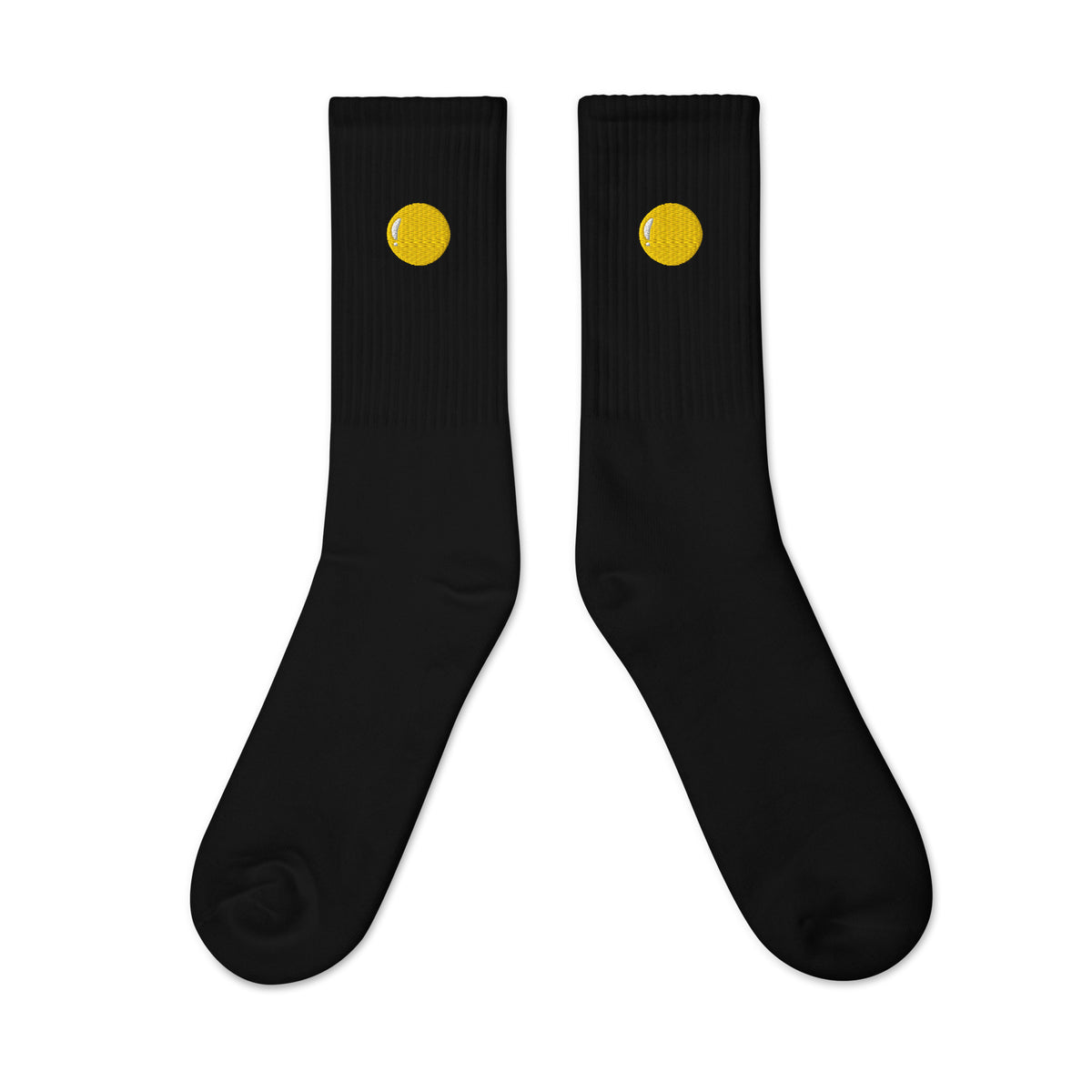 Crew socks, outside view, black, "Egg Yolk" embroidery on both socks