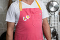 Kenji López-Alt wears his pink Hedley & Bennett collaboration apron