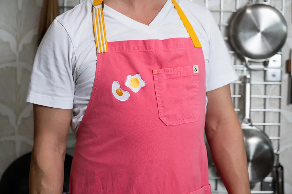 Kenji López-Alt wears his pink Hedley & Bennett collaboration apron
