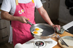 Kenji López-Alt wears his pink Hedley & Bennett collaboration apron