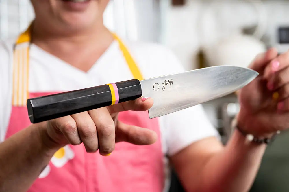 Kenji López-Alt poses with his KAN knife collaboration