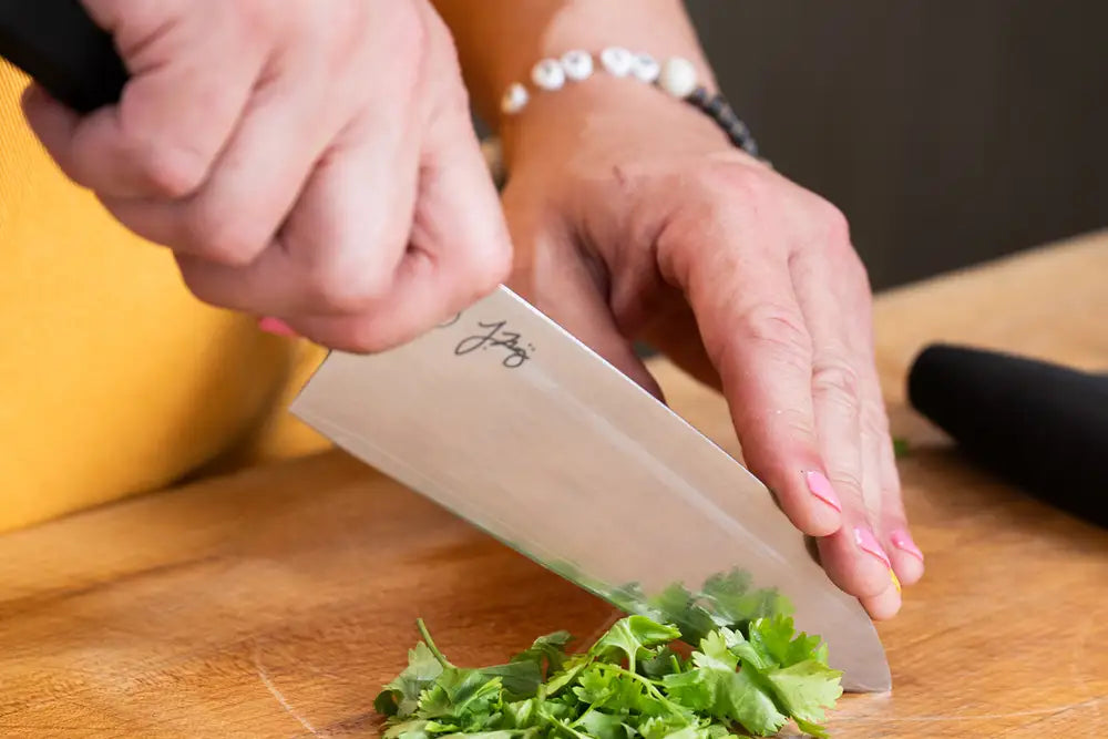 Kenji López-Alt slices cilantro with his KAN knife