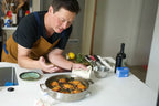 Kenji López-Alt shows off a braised chicken dish that he made in his new Our Place Braiser collaboration product