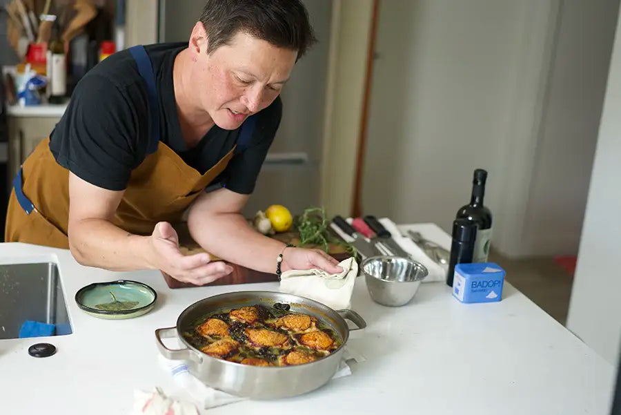 Kenji López-Alt shows off a braised chicken dish that he made in his new Our Place Braiser collaboration product