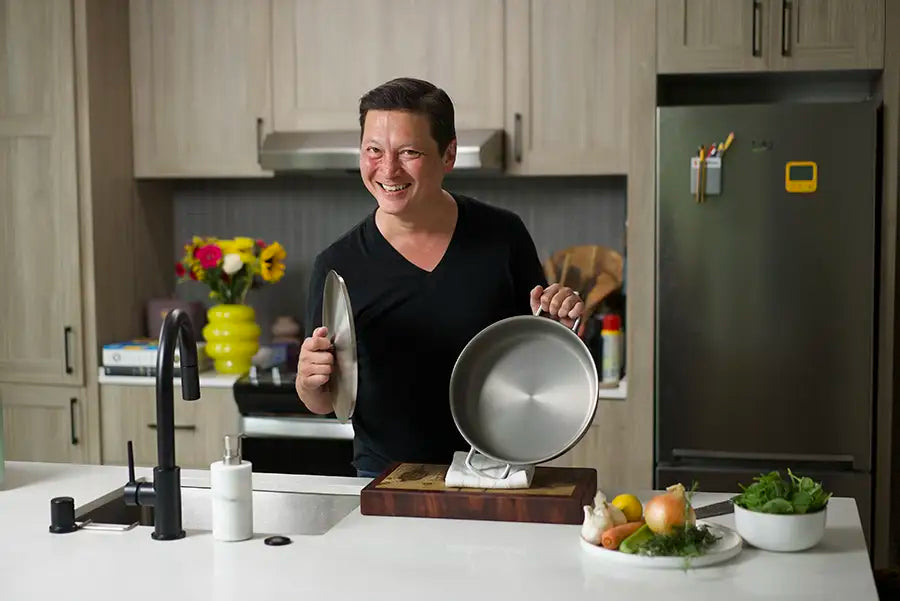 Kenji López-Alt poses with his new Our Place Braiser collaboration product