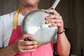 Kenji López-Alt poses with his Our Place Titanium Pro Pans