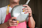 Kenji López-Alt poses with his Our Place Titanium Pro Pans