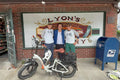 Kenji López-Alt poses with the Seattle E-Rider food tour team