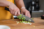 Kenji López-Alt slices a scallion with his Vonhelmick knife