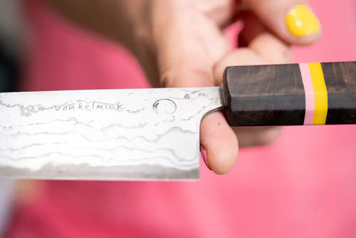 Kenji López-Alt poses with his Vonhelmick knife collaboration