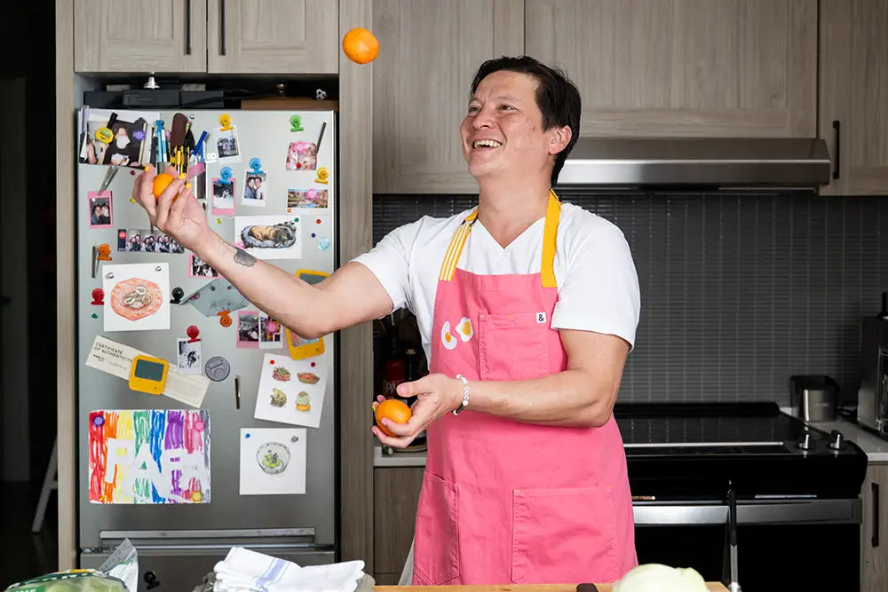 Kenji López-Alt juggles satsumas in his kitchen